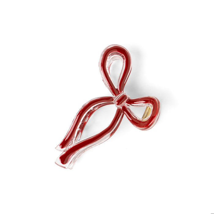 Red bow-shaped object on a white background