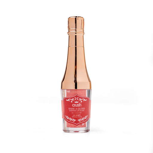 Lip gloss with rose gold cap on a white background