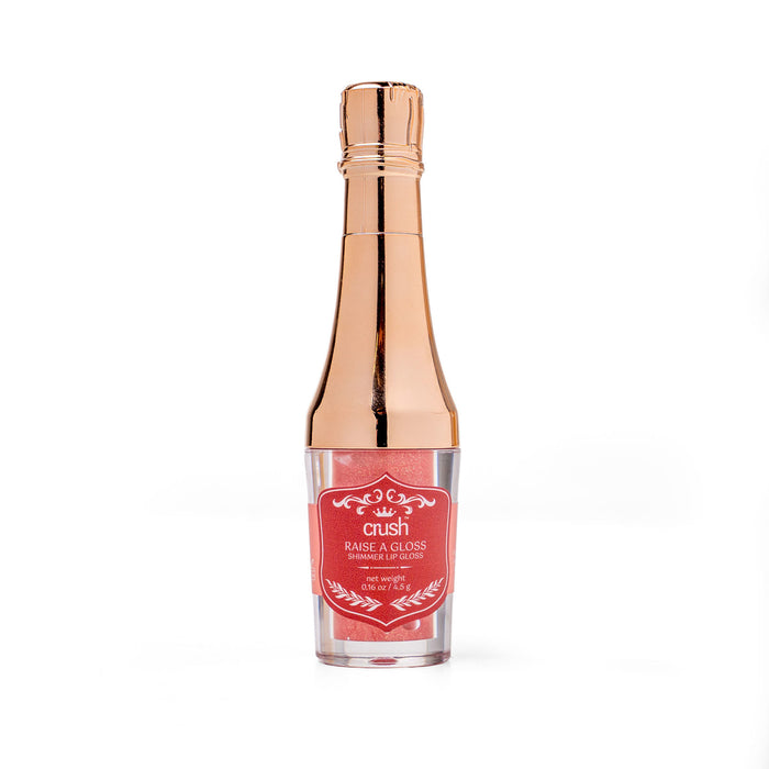 Lip gloss with rose gold cap on a white background