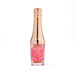 Rose gold lip gloss with pink label on a white background