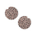 Pair of leopard print car coasters on a white background