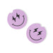 Two purple circular stickers with smiley face designs on a white background
