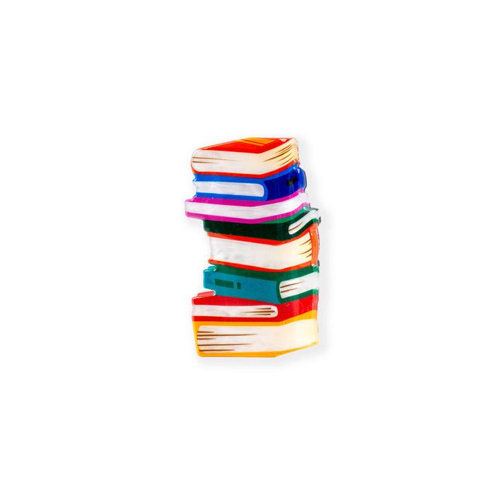 Stack of colorful books on a white background