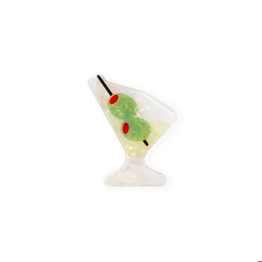 Squishy toy resembling a cocktail with olives on a white background