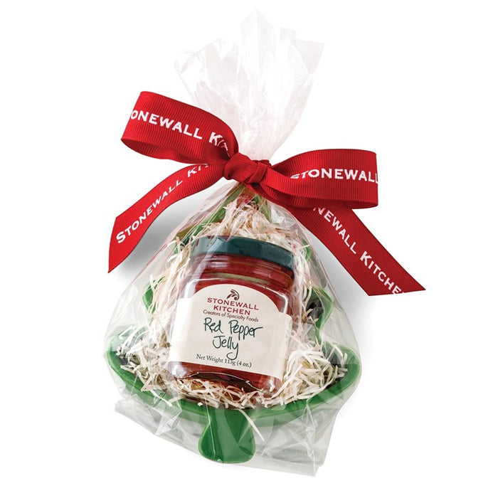 Stonewall Kitchen red pepper jelly in a decorative bag with a red ribbon on a white background