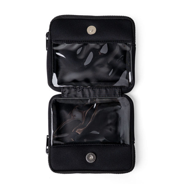 Black travel pouch with clear compartments on a white background