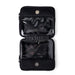 Black travel pouch with clear compartments on a white background