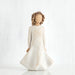 Decorative angel figurine with a white dress on a white background
