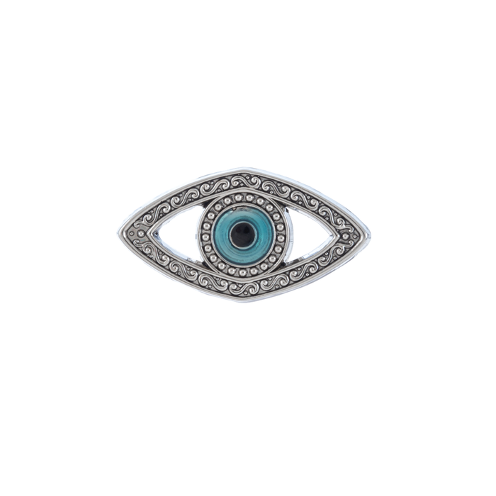 Decorative eye-shaped object with blue center and silver frame on a white background