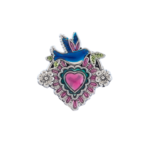 Decorative brooch with heart design on a white background