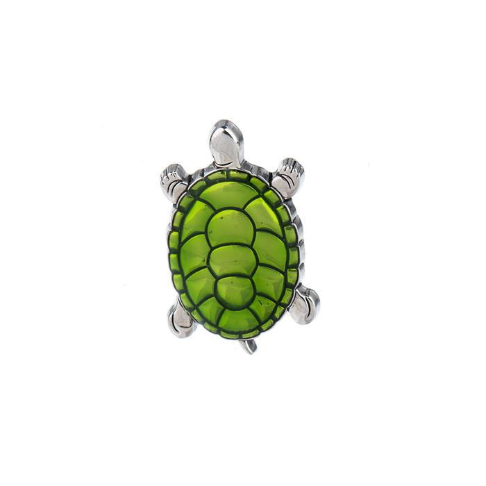 Turtle-shaped object with green shell and silver frame on a white background