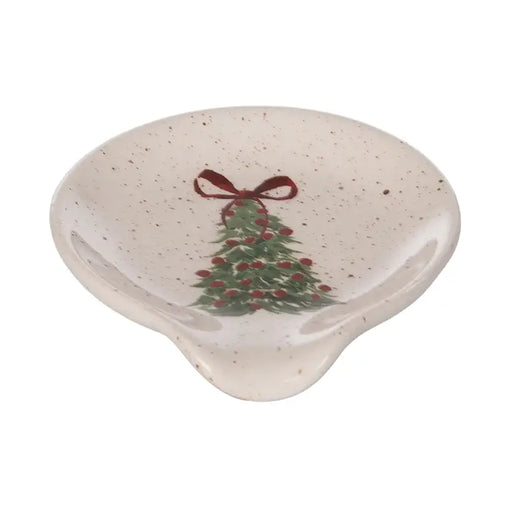 Speckled ceramic dish with Christmas tree and bow design on a white background