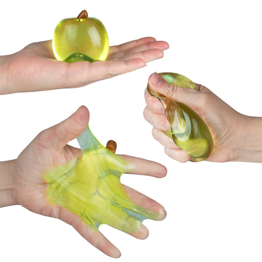 Hands interacting with a yellow gel-like substance on a white background