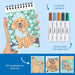 Coloring book with a detachable storage tray, markers, and meditative scene illustrations on a blue background.