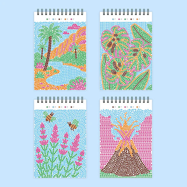 Four colorful notebooks with mosaic-style designs on a light blue background