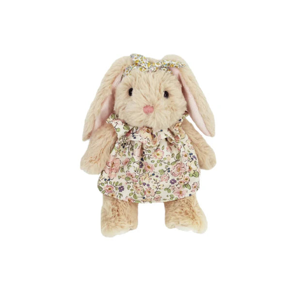 Plush rabbit toy wearing a floral dress and headband on a white background