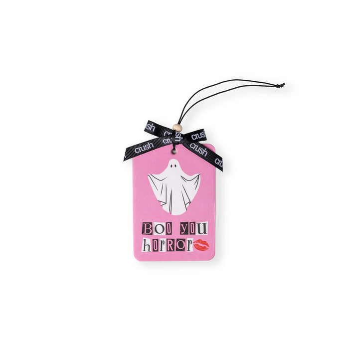 Pink tag with ghost illustration and text on a white background