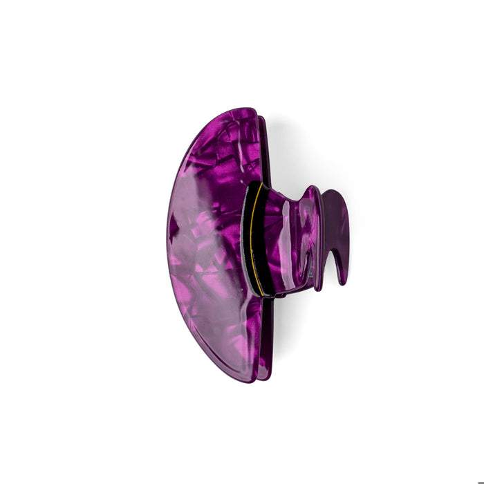Purple crystal-like object on a white background