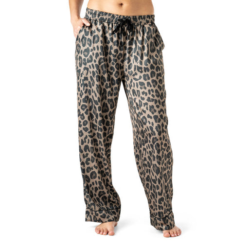 Leopard print pajama pants worn by a person on a white background