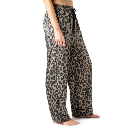 Leopard print pajama pants worn by a person on a white background
