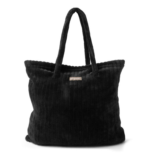 Black textured tote bag with a visible brand label on a white background