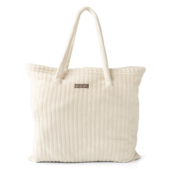 Beige textured tote bag on a white background