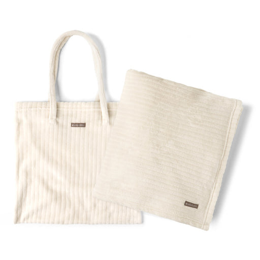 Beige textured tote bag and blanket set on a white background