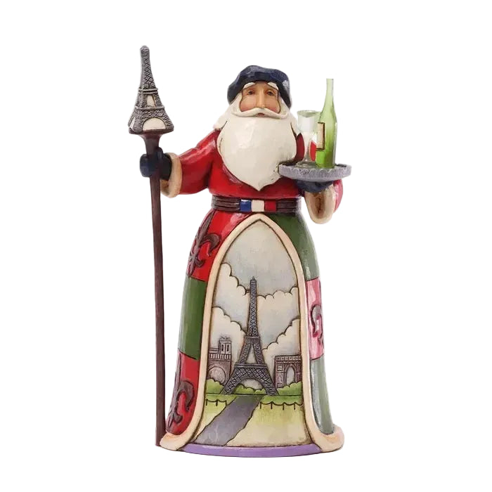 Decorative figurine of a character holding the Eiffel Tower on a white background