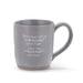 Gray mug with text quote on a white background
