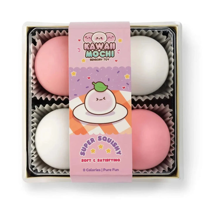 A boxed set of four soft squishy sensory toys shaped like mochi, with two pink and two white round pieces arranged in a clear plastic tray. A pink paper band wraps around the center, featuring cartoon mochi artwork and the text 'KAWAII MOCHI' and 'SUPER SQUISHY'.