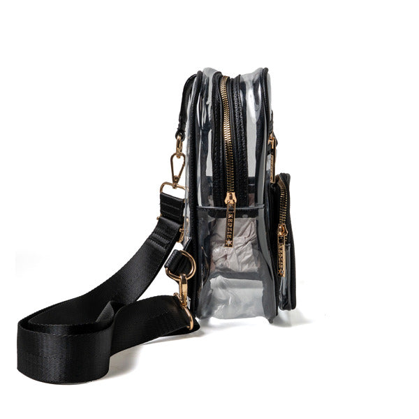 Clear handbag with black strap and gold zippers on a white background