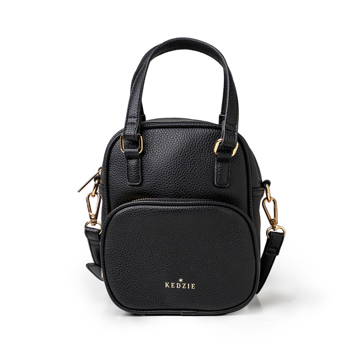 Black handbag with gold accents on a white background