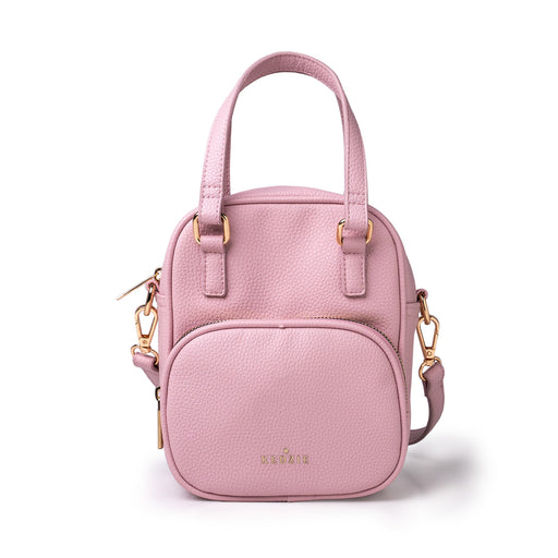 Pink handbag with gold accents on a white background
