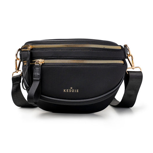 Black handbag with gold zippers and 'Kedzie' branding on a white background