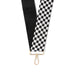 Black and white checkered strap with a gold clasp on a white background