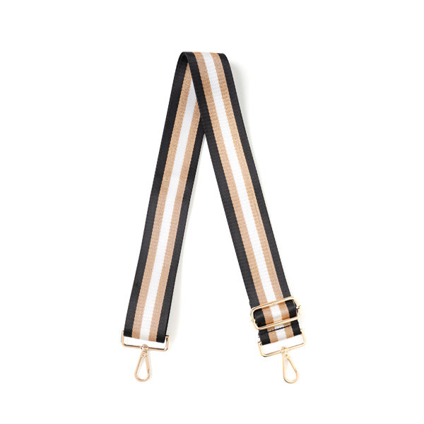 Striped bag strap with black, beige, and white pattern on a white background