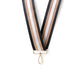 Striped ribbon with a gold clasp on a white background