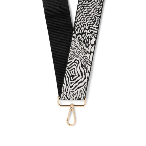 Black and white patterned strap with gold clasp on a white background