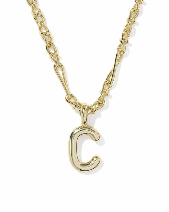 A gold initial necklace featuring a polished lowercase-style letter 'c' pendant on a matching chain, shown against a plain white background.