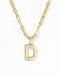 A gold initial necklace featuring a polished, open capital letter 'D' pendant on a matching gold chain, photographed against a clean white background.