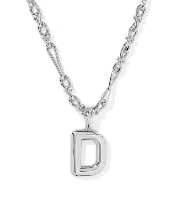 A silver-toned initial necklace featuring a polished, open capital letter 'D' pendant on a matching chain, set against a clean white background.