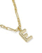 Gold necklace with a 'E' pendant on a white background