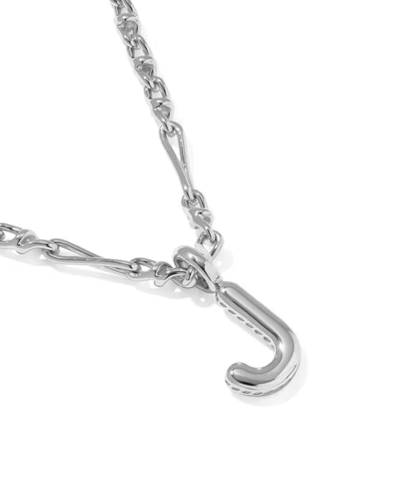 A close-up of a polished silver-tone chain necklace with a matching J-shaped pendant, shown on a clean white background.