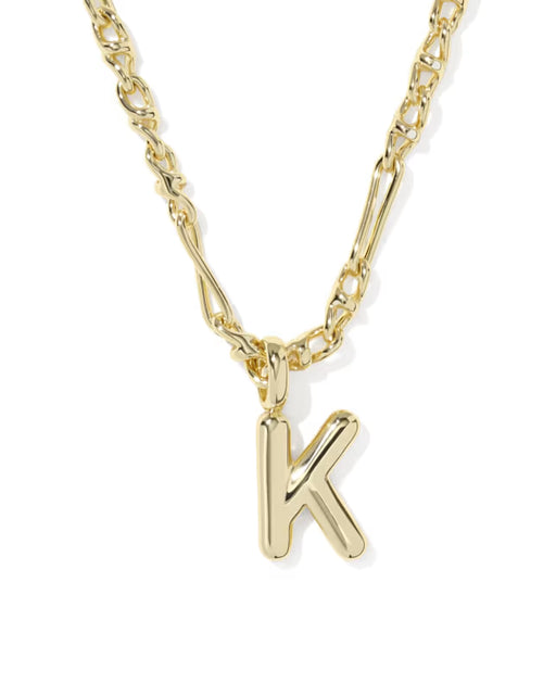Gold necklace with a 'K' pendant on a white background