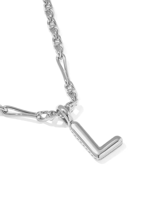 A close-up of a silver-toned chain necklace with a polished letter 'L' pendant, shown on a clean white background.