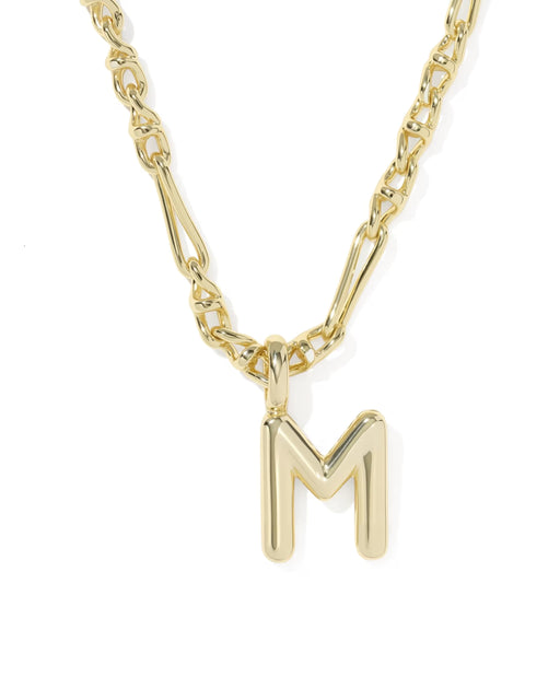 Gold necklace with a 'M' pendant on a white background