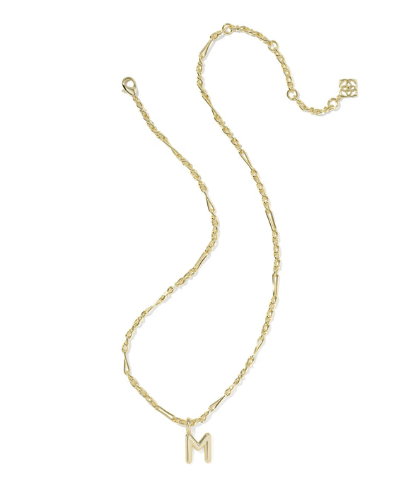 Gold necklace with a 'M' pendant on a white background
