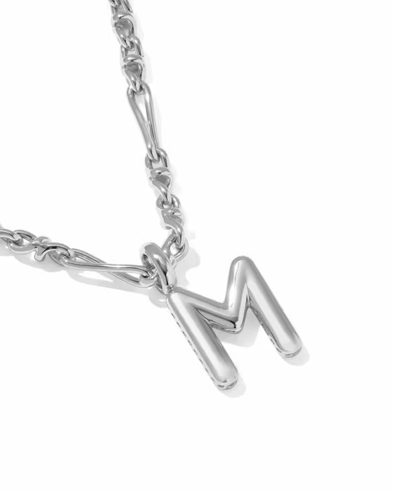 A silver initial necklace featuring a polished lowercase-style letter 'm' pendant on a matching chain, shown against a clean white background.