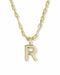 A gold initial necklace featuring a polished letter 'R' pendant on a twisted link chain, shown against a plain white background.