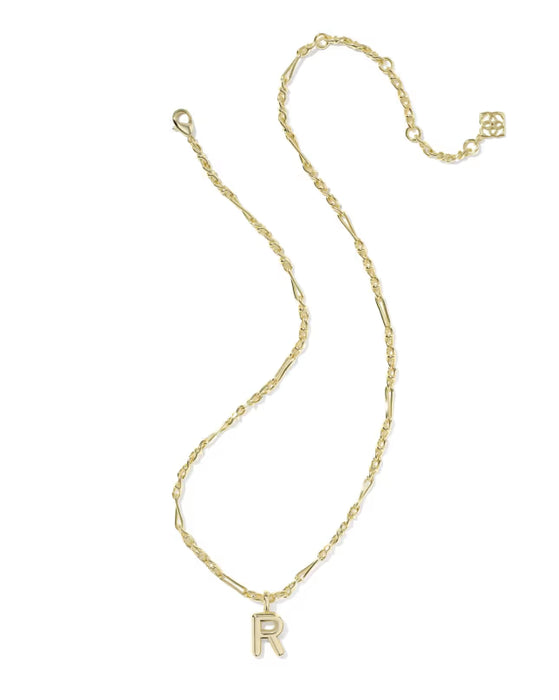 Gold necklace with a letter 'G' pendant on a white background